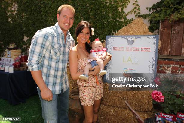 Television personality Melissa Rycroft and husband Tye Strictland introduce their daughter, Ava Grace Strickland , to friends during a "Sip 'n' See"...