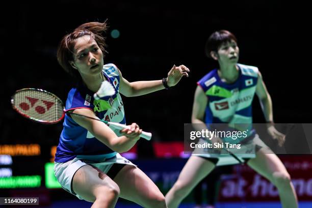 Yuki Fukushima and Sayaka Hirota of Japan compete in the Women's Doubles second round match against Delphine Delrue and Lea Palermo of France during...