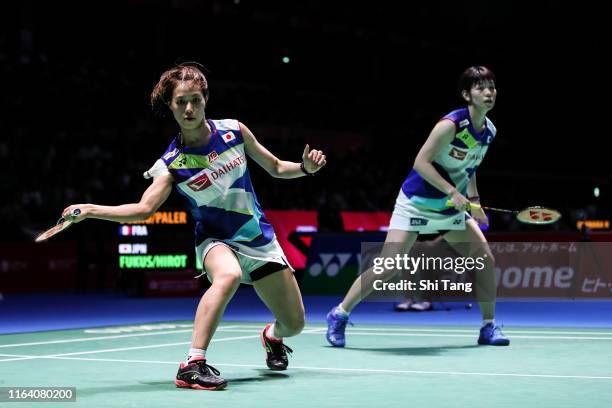 Yuki Fukushima and Sayaka Hirota of Japan compete in the Women's Doubles second round match against Delphine Delrue and Lea Palermo of France during...