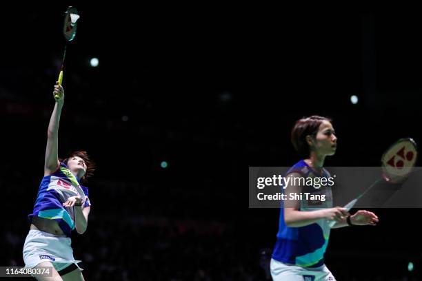 Yuki Fukushima and Sayaka Hirota of Japan compete in the Women's Doubles second round match against Delphine Delrue and Lea Palermo of France during...