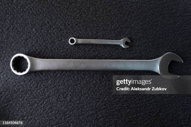 two spanners wrench for professional car repair - torque wrench stock pictures, royalty-free photos & images
