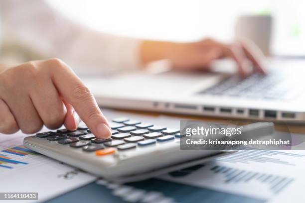 business woman accounting concept financial in office - compito a casa fotografías e imágenes de stock