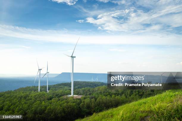 landscape with turbine green energy electricity, windmill for electric power production, wind turbines generating electricity on the mountain , clean energy concept. - wind turbines stock-fotos und bilder