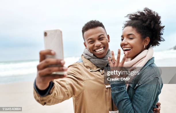 the best love stories happen on the beach - black women engagement rings stock pictures, royalty-free photos & images