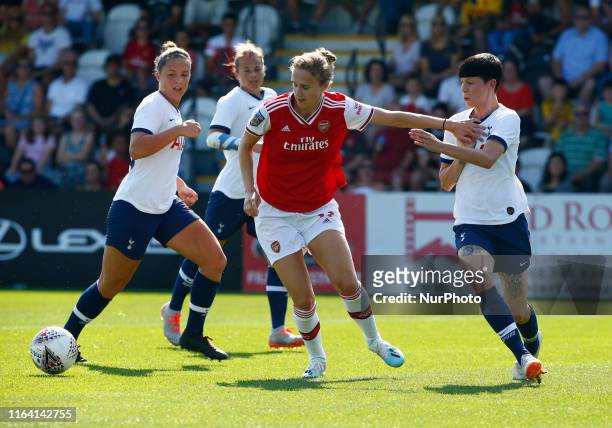 Vivianne Miedema of Arsenal holds of Ashleigh Neville of Tottenham Hotspur Ladies during Friendly match between Arsenal Women and Tottenham Hotspur...