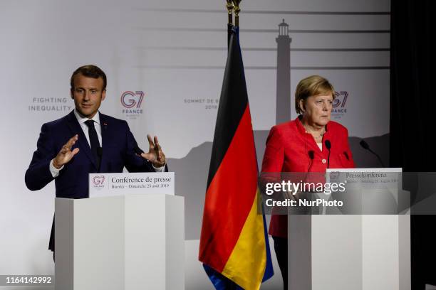 Emmanuel Macron, Angela Merkel during a press conference on the situation in Sahel during the G7 summit in Biarritz, south-west France on August 25...