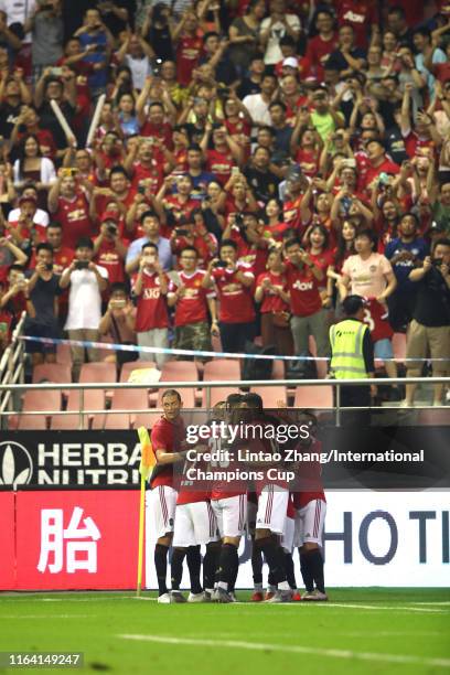 Angel Gomes of Manchester United celebrates scoring his side's second goal with his team mates during the International Champions Cup match between...