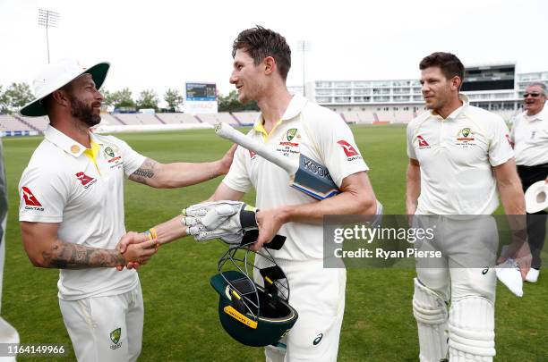 Matthew Wade of Graeme Hick XII congratulates Cameron Bancroft of Graeme Hick XII after day three of the Australian Cricket Team Ashes Tour match...