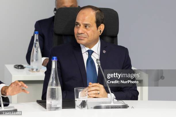 Abdel Fattah al-Sissi, President of Egypt, attends a working session on &quot;International Economy and Trade, and International Security...