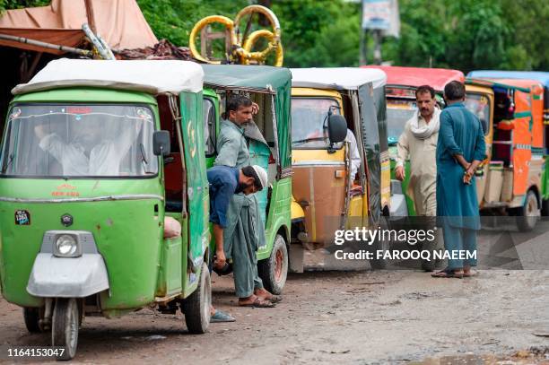 Pakistani Rickshaw Photos and Premium High Res Pictures - Getty Images