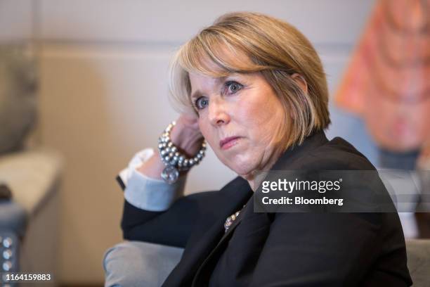 Michelle Lujan Grisham, governor of New Mexico, listens during an interview at her office in Santa Fe, New Mexico, U.S., on Thursday, Aug. 8, 2019....