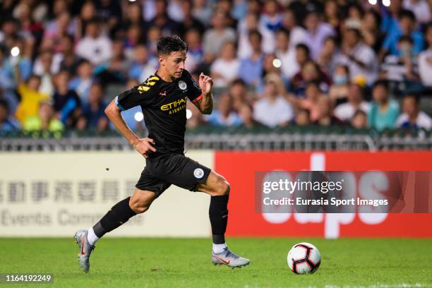 Nabil Touaizi of Manchester City runs with the ball during the preseason friendly match between Kitchee and Manchester City at the Hong Kong Stadium...