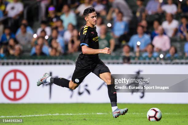 Nabil Touaizi of Manchester City runs with the ball during the preseason friendly match between Kitchee and Manchester City at the Hong Kong Stadium...
