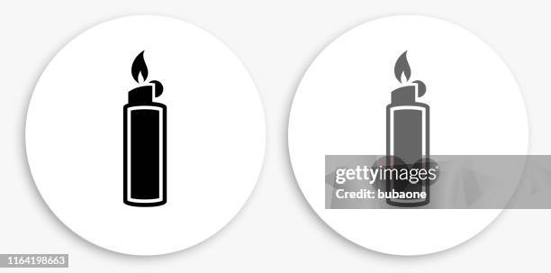 lighter black and white round icon - cigarette lighter stock illustrations