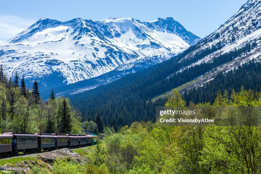 Tourist Train returning from the Canadian Border back to Skagway AK through the White Pass Mountain gorge