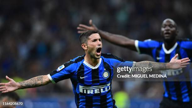 Inter Milan's Italian midfielder Stefano Sensi celebrates after scoring during the Italian Serie A football match Inter Milan vs US Lecce on August...