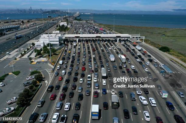 Traffic backs up at the San Francisco-Oakland Bay Bridge toll plaza along Interstate 80 on July 25, 2019 in Oakland, California. The State of...