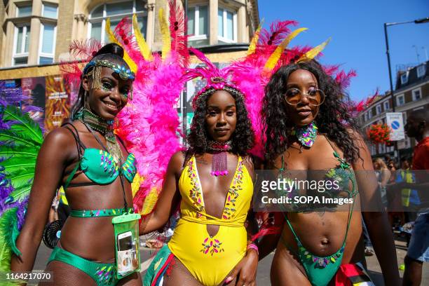 Dancers in colourful costumes during the 2019 Notting Hill Carnival, Europe's largest street party and a celebration of Caribbean traditions and the...