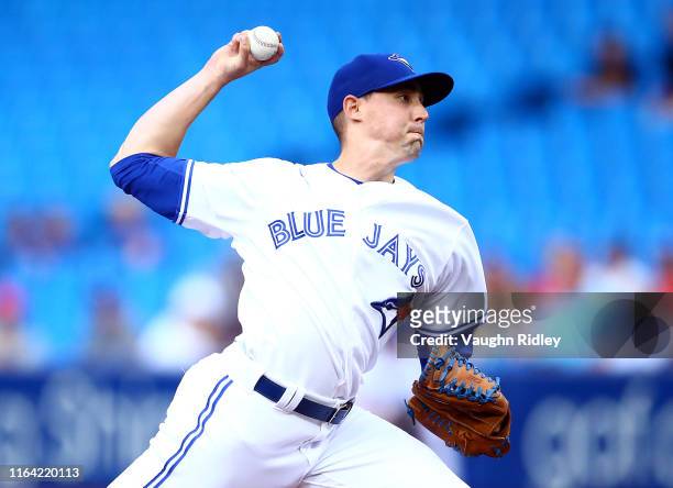 Aaron Sanchez of the Toronto Blue Jays delivers a pitch in the first inning during a MLB game against the Cleveland Indians at Rogers Centre on July...
