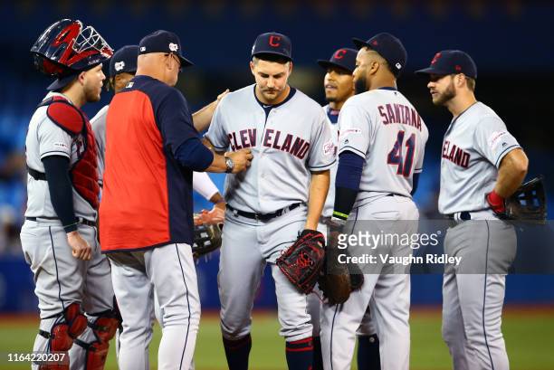 Trevor Bauer of the Cleveland Indians is pulled from the game in the eighth inning during a MLB game against the Toronto Blue Jays at Rogers Centre...