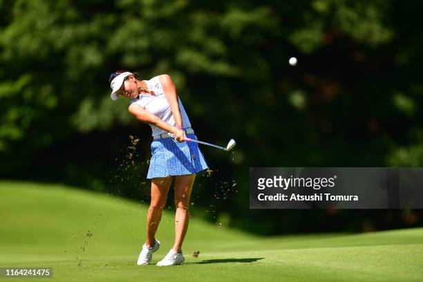 Hikari Fujita of Japan hits her second shot on the 3rd hole during the first round of the Century 21 Ladies Golf Tournament at Ishizaka Golf Club on...