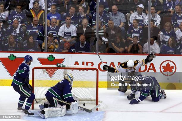 Patrice Bergeron of the Boston Bruins celebrates after scoring the 3rd goal in the second period against Roberto Luongo of the Vancouver Canucks...
