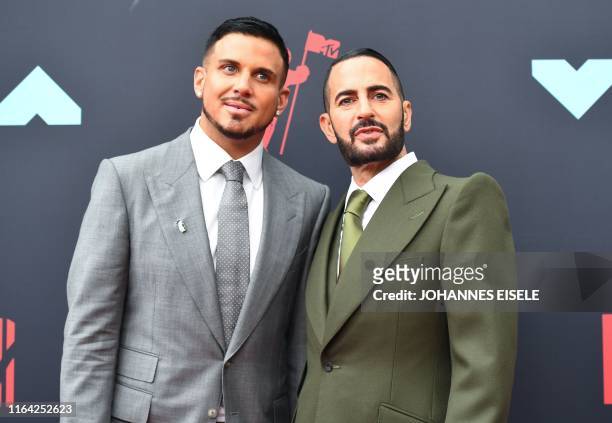 Fashion Trailblazer Award recipient US designer Marc Jacobs and husband Charly "Char" Defrancesco arrive for the 2019 MTV Video Music Awards at the...