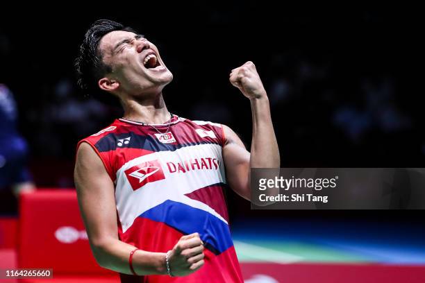 Kento Momota of Japan celebrates the victory in the Men's Singles quarter finals match against Anthony Sinisuka Ginting of Indonesia during day four...
