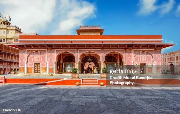 city palace, jaipur, which includes the chandra mahal and mubarak mahal palaces and other buildings, is a palace complex in jaipur, the capital of the rajasthan state, india. - palace stock pictures, royalty-free photos & images