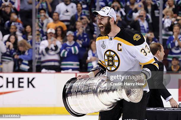 Zdeno Chara of the Boston Bruins celebrates with the Stanley Cup after defeating the Vancouver Canucks in Game Seven of the 2011 NHL Stanley Cup...