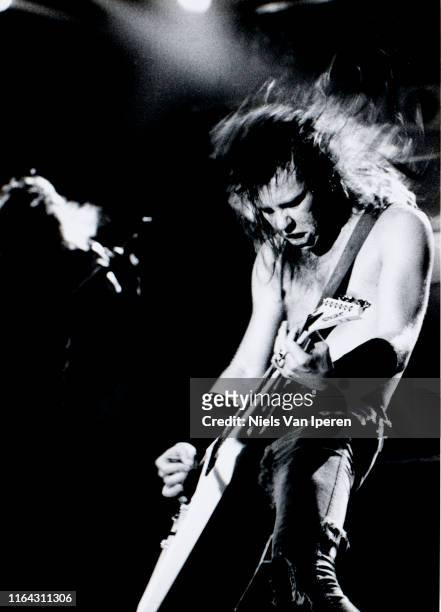 James Hetfield, Metallica, performing on stage, Groenoordha, Leiden, Netherlands, 11th May 1988.
