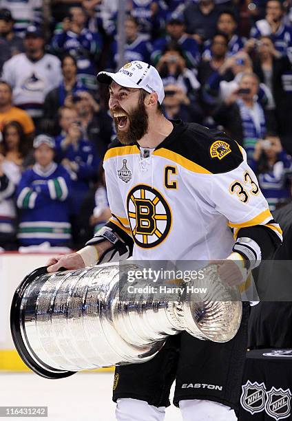 Zdeno Chara of the Boston Bruins celebrates with the Stanley Cup after defeating the Vancouver Canucks in Game Seven of the 2011 NHL Stanley Cup...