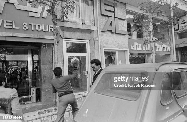 Demonstrators attack and loot the El Al Israeli Airlines offices in Tehran, 4th November 1978.