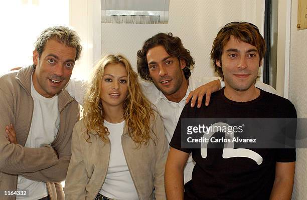 Mexican singer Paulina Rubio poses for a photograph with musical group "Cafe Quijano" at the Cadena Dial radio station to promote her new tour...