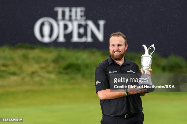 Shane Lowry of Ireland with The Claret Jug after securing victory during the final round of the 148th Open Championship held on the Dunluce Links at...