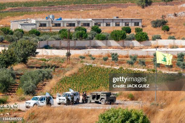 Picture taken from the Israeli side of the border with Lebanon on August 27, 2019 shows Lebanese army and United Nations Interim Forces in Lebanon...