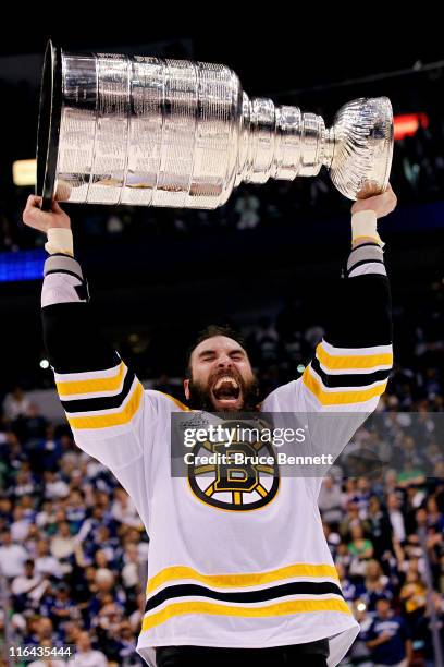 Zdeno Chara of the Boston Bruins celebrates with the Stanley Cup after defeating the Vancouver Canucks in Game Seven of the 2011 NHL Stanley Cup...