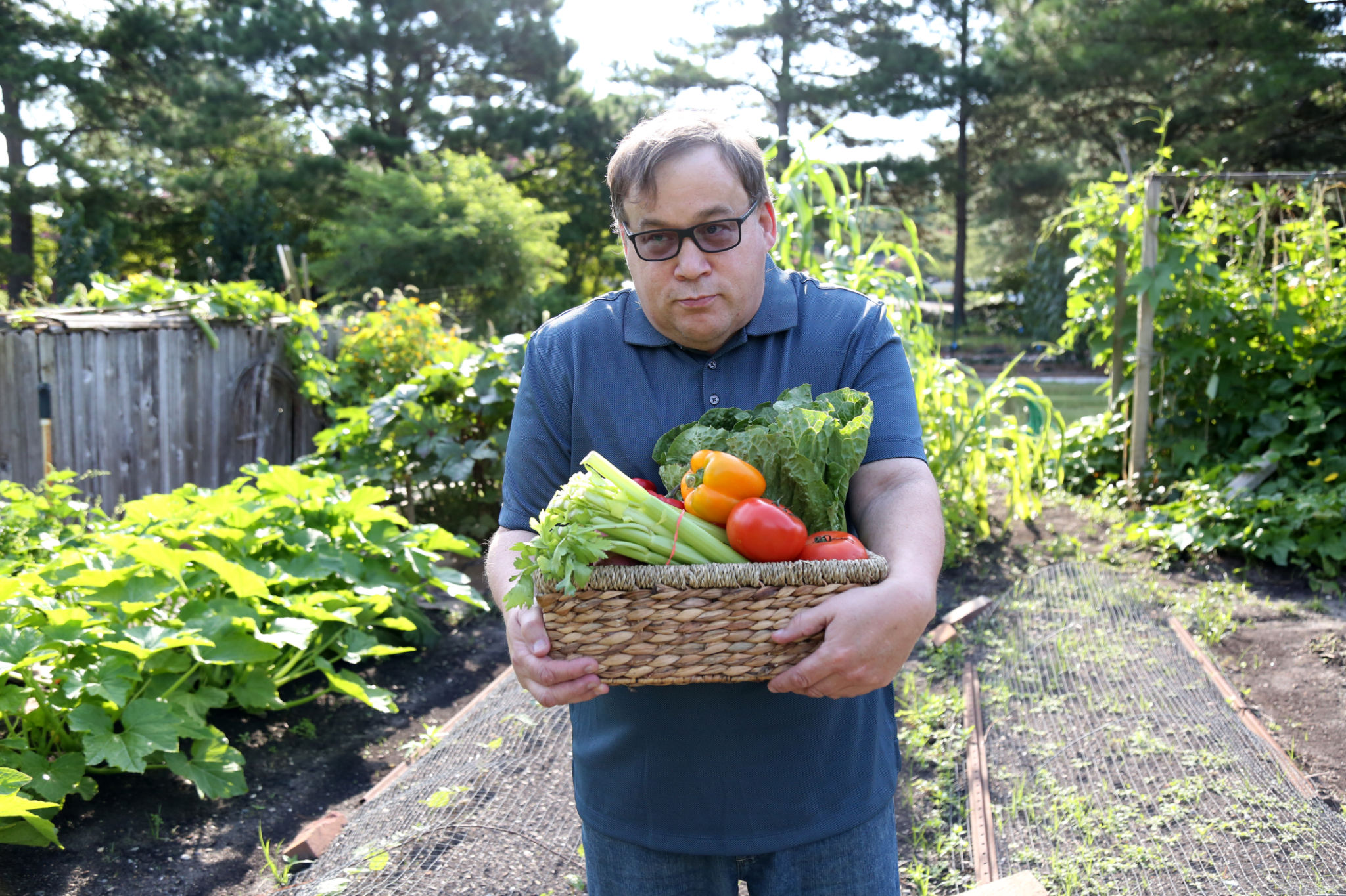 Disabled man works in the garden Disabled man works in the garden