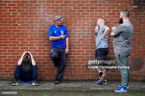 Supporters at Bury's Gigg Lane ground react to a decision by C&N Sporting Risk, saying it was unable to continue with its takeover of the club on...