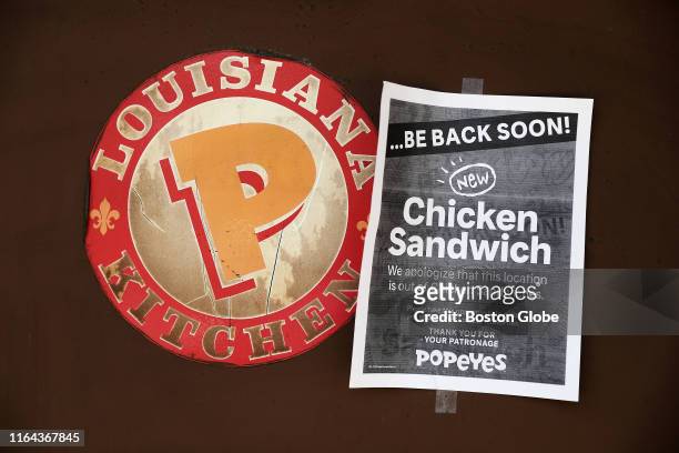 Sign indicating that chicken sandwiches are sold out hangs at the Popeyes location on Brookline Avenue near Fenway Park in Boston on Aug. 26, 2019....