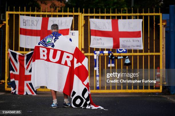 Supporter seen at Bury's Gigg Lane ground following a decision by C&N Sporting Risk, saying it was unable to continue with its takeover of the club...