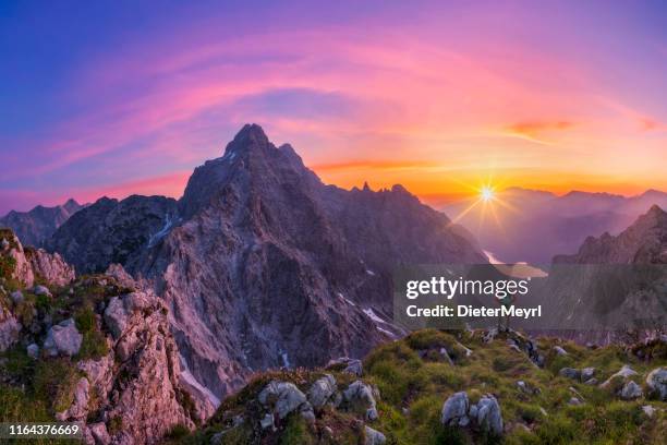 hiker at glory sunrise with view to watzmann and königssee, berchtesgaden national park - berchtesgaden stock pictures, royalty-free photos & images