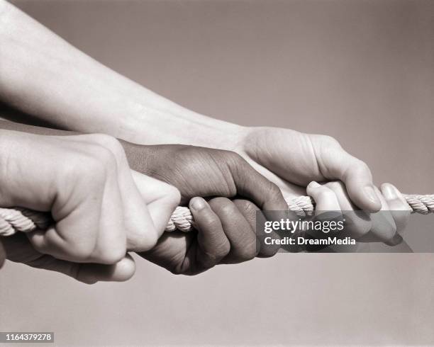 Two Hand Rope Pull 185 Two Hands Pulling A Rope Stock Photos, High-Res Pictures, and ...