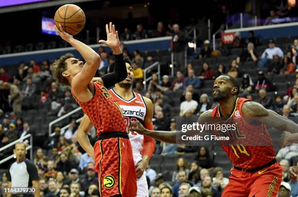 Trae Young of the Atlanta Hawks drives to the hoop against the Washington Wizards at Capital One Arena on February 4, 2019 in Washington, DC.