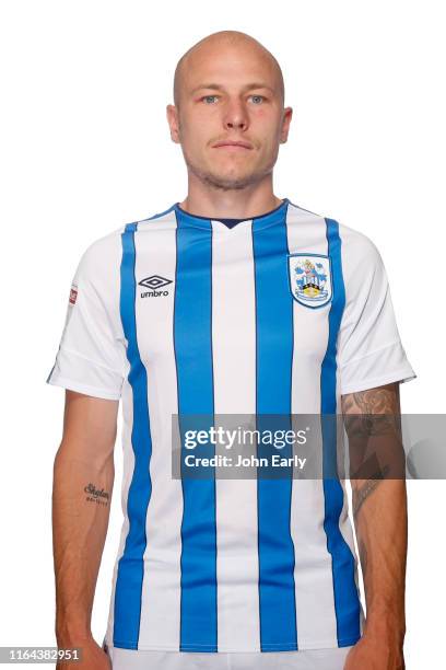Aaron Mooy of Huddersfield Town wearing the 2019/20 home kit on July 23, 2019 in Huddersfield, England.