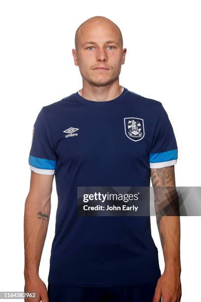 Aaron Mooy of Huddersfield Town wearing the 2019/20 second kit on July 23, 2019 in Huddersfield, England.