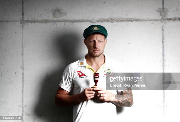 James Pattinson of Australia poses with a replica Ashes Urn after the Australia Ashes Squad Announcement at The Ageas Bowl on July 26, 2019 in...