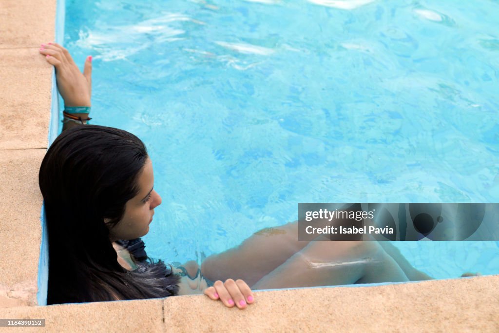 Woman relaxed at pool