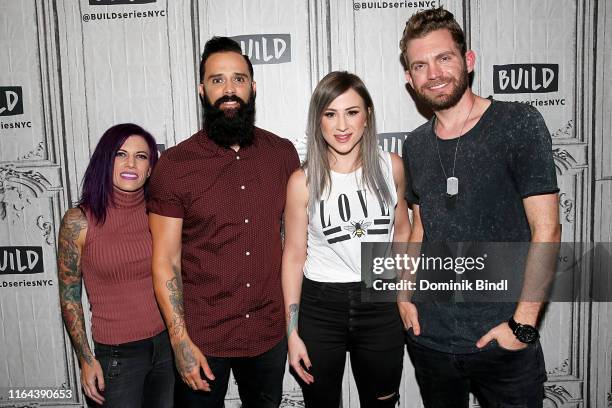 Korey Cooper, John Cooper, Jen Ledger and Seth Morrison of Skillet attend the Build Series to discuss 'Victorious' at Build Studio on July 26, 2019...