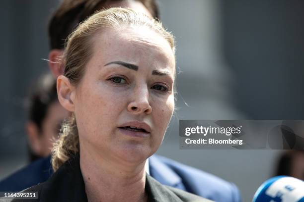 Chauntae Davies, an alleged victim of Jeffrey Epstein, speaks to members of the media outside of federal court in New York, U.S., on Tuesday, Aug....